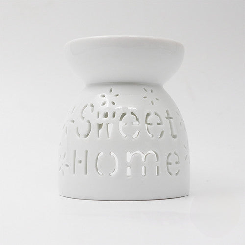 Heartwarming wax burner featuring a house motif, great for creating a cozy atmosphere at home. / Αρωματιστής με θέμα σπιτιού, ιδανικός για μια ζεστή και φιλόξενη ατμόσφαιρα.